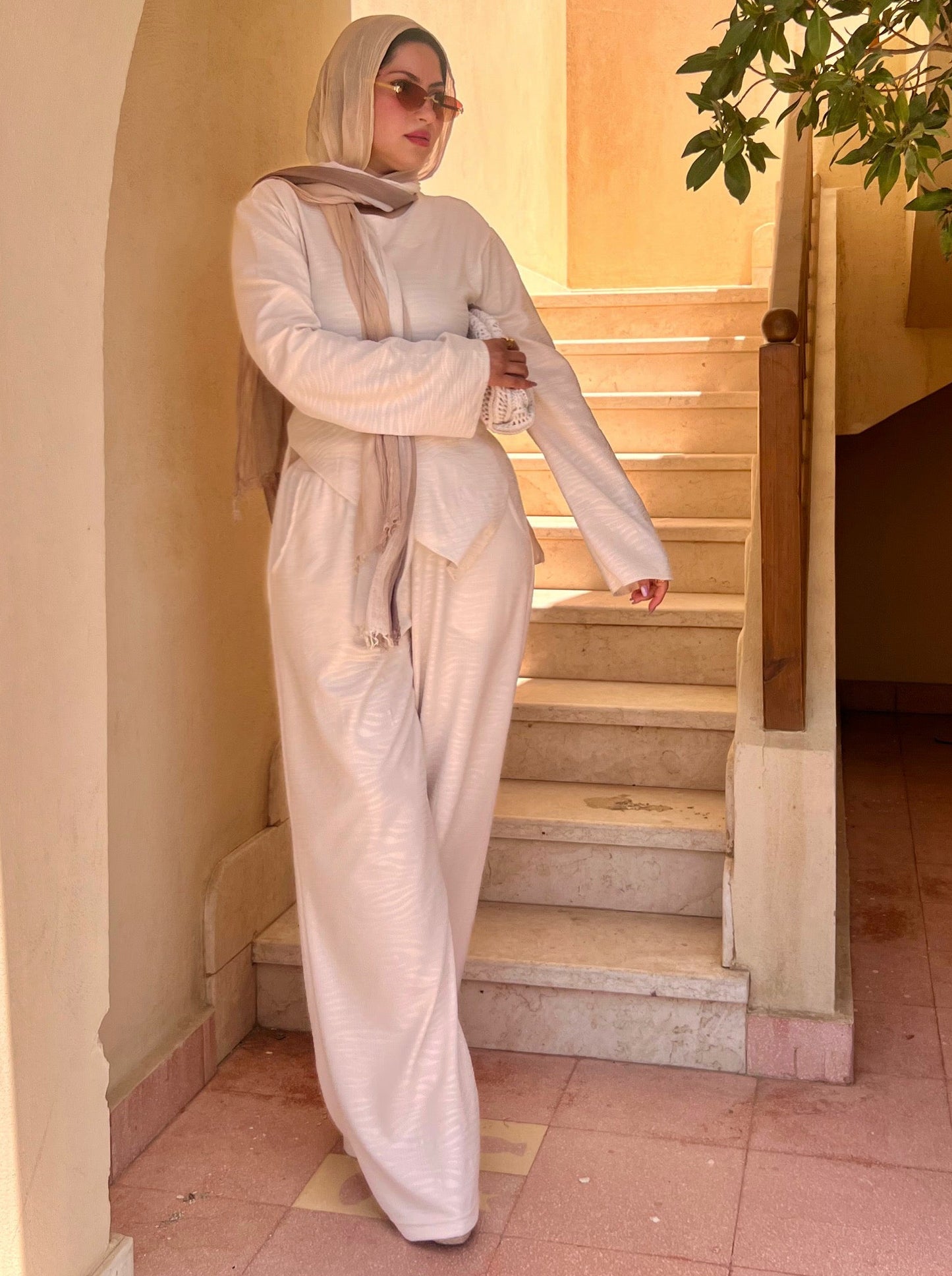 Off-white two-piece set with a wave pattern
