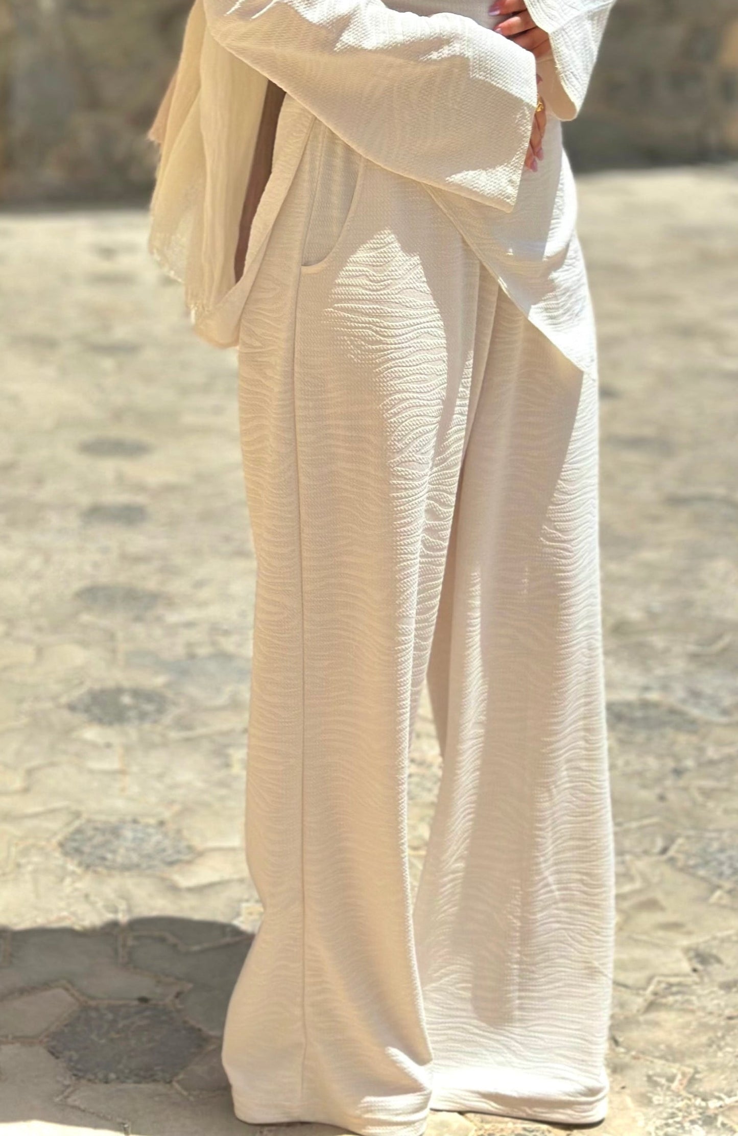 Off-white blouse with a wave pattern