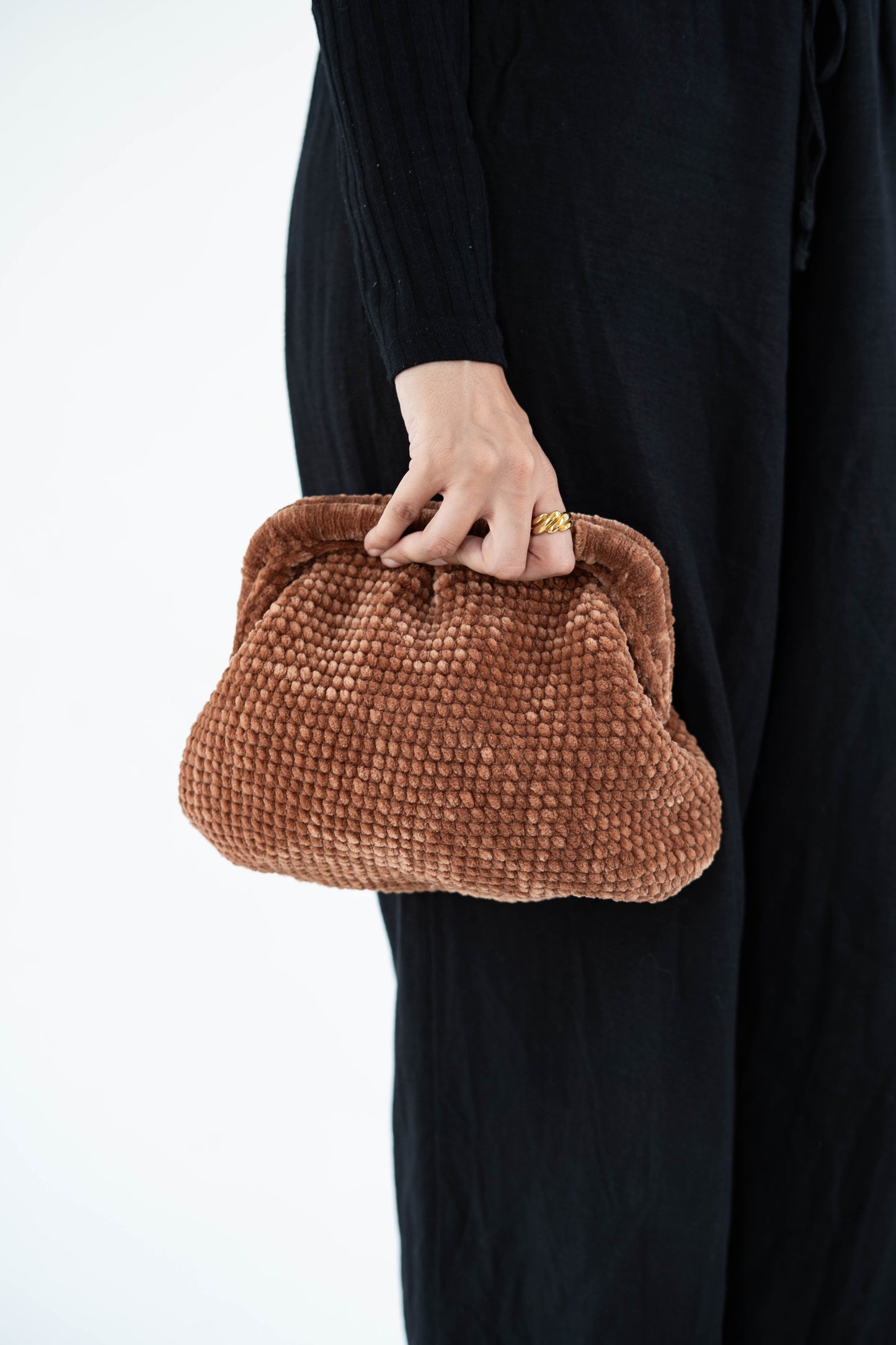 Caramel brown crochet clutch