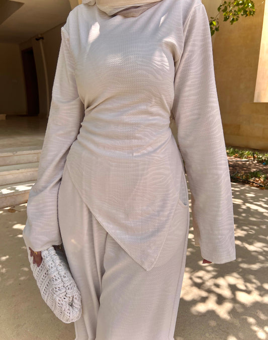 Off-white blouse with a wave pattern